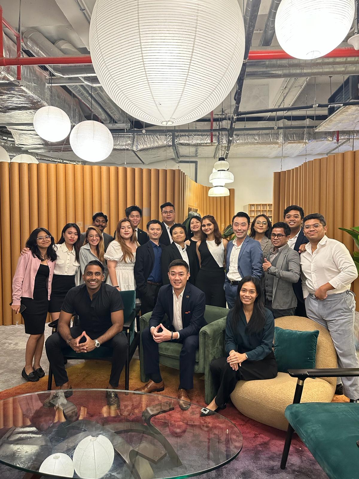 DC Marketing team members gathered together in the office lounge